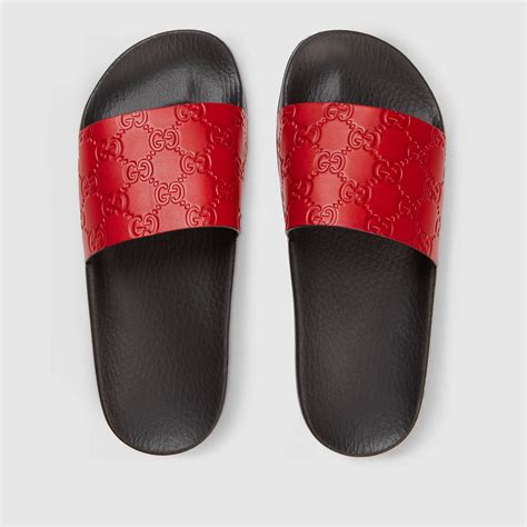 red gucci slides men|gucci red slides women.